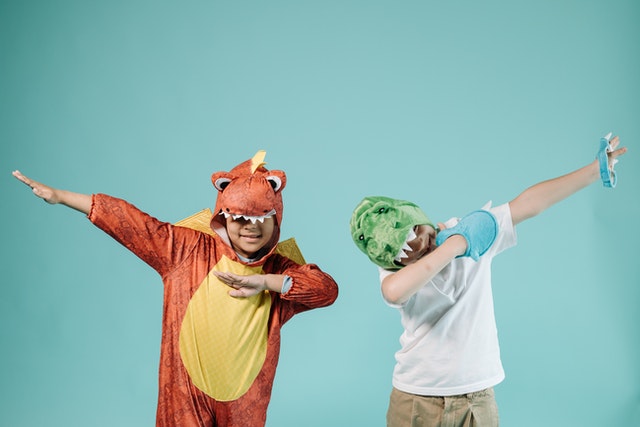 two-boys-in-dinosaur-costumes