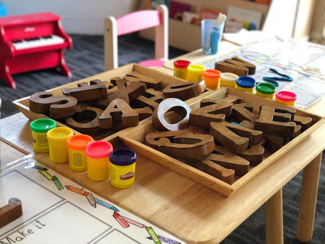 brown letters on table preschool